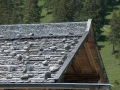 Rocks used as snow guards for roof